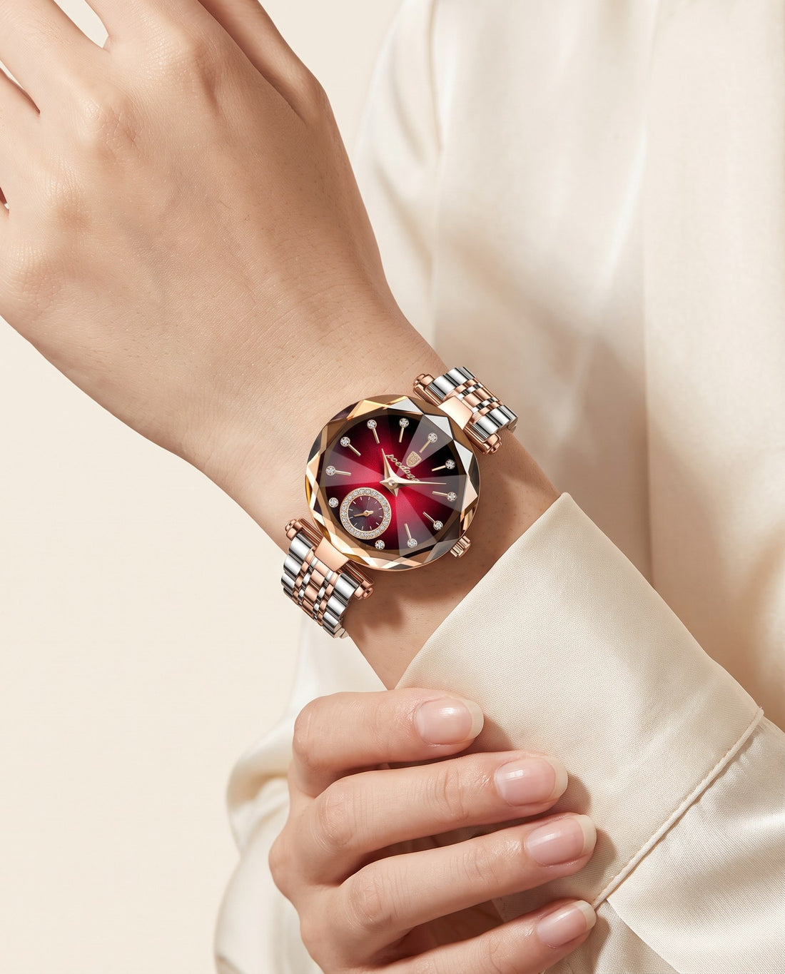 Prism Diamond-Cut Ladies Red dial, two-tone bracelet on the wrist