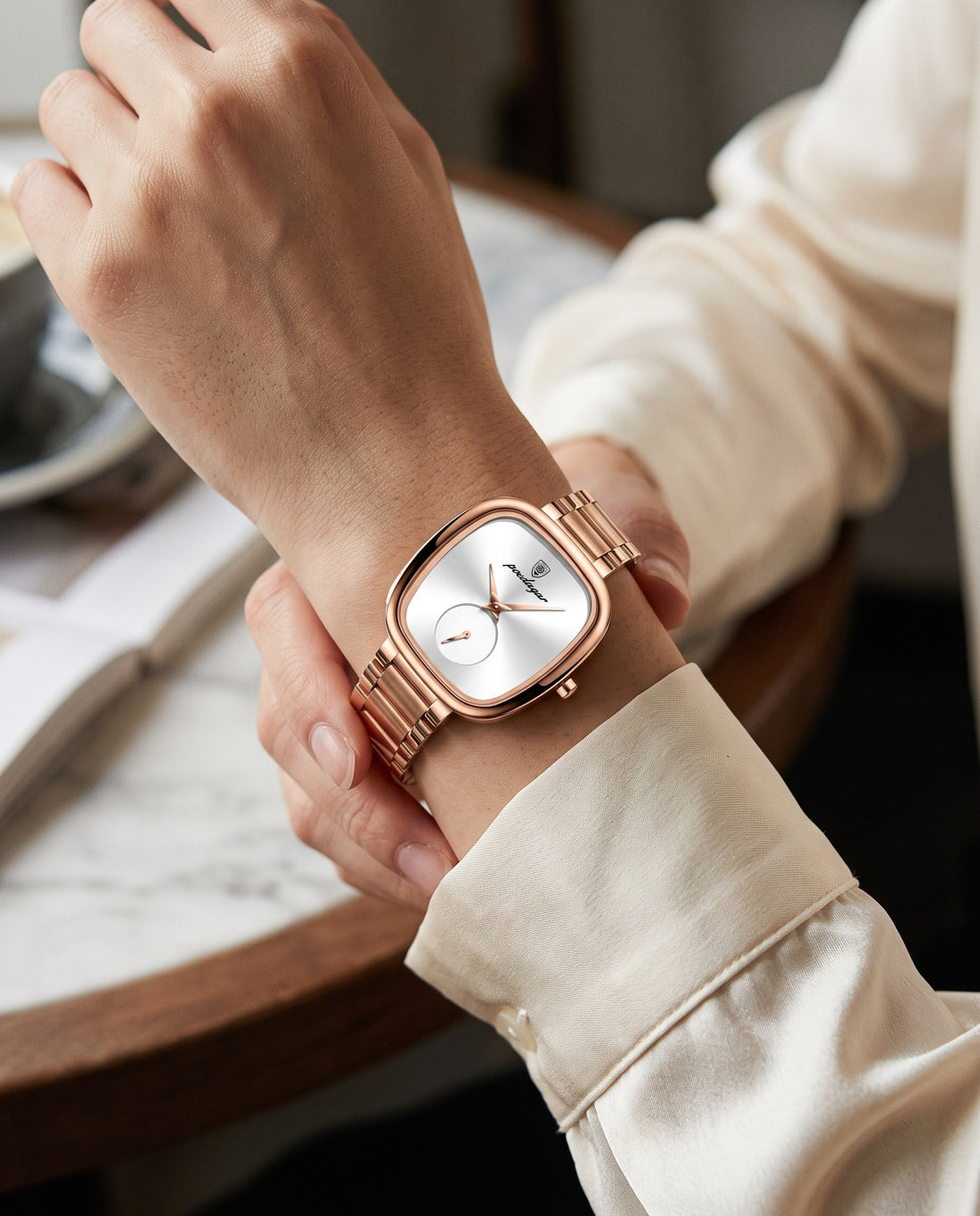 Rose Cushion Square Rose Gold case, White dial on the wrist